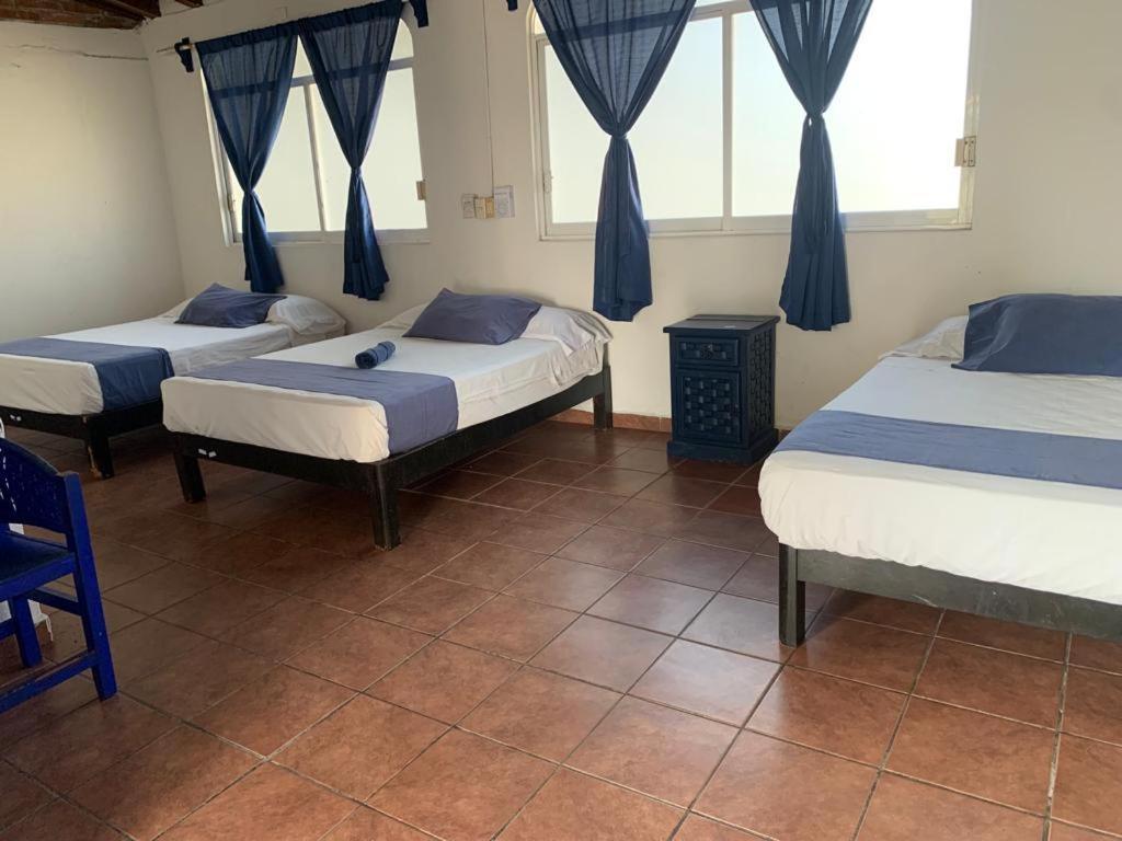 Mayflower Hotel & Hostal Пуерто Ескондидо Екстериор снимка